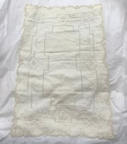 Placemat with floral embroidery and cut work